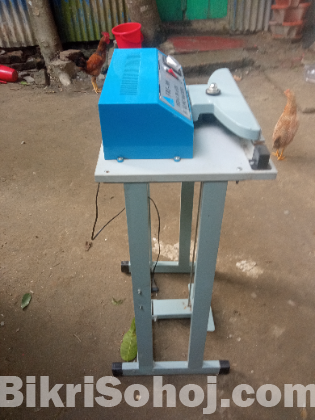 Packet sealing machine